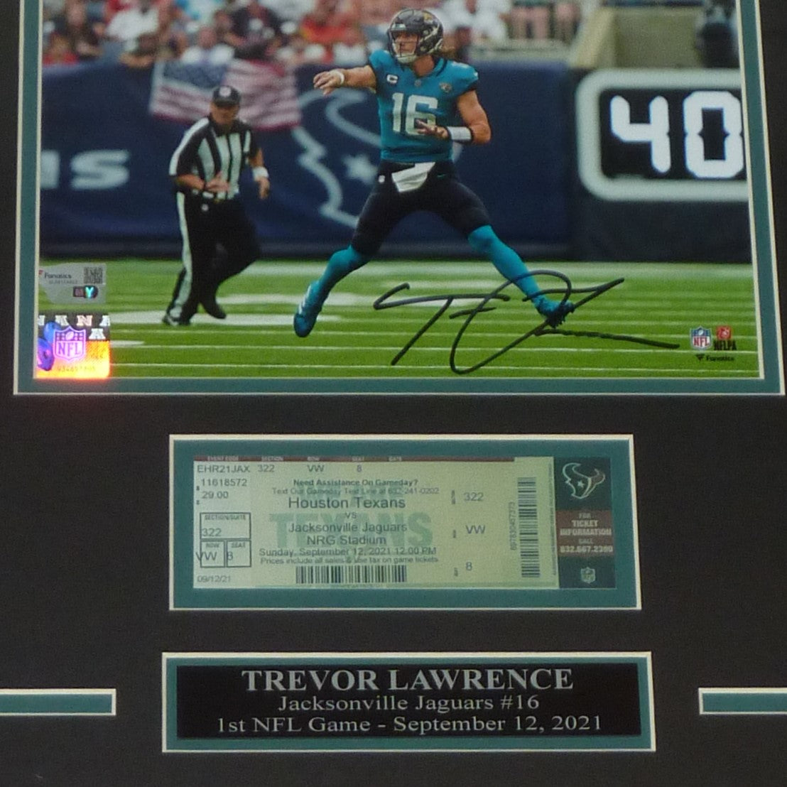 Trevor Lawrence Autographed Jacksonville Jaguars Deluxe Framed 8x10 Photo with 1st Game Replica Ticket - Fanatics