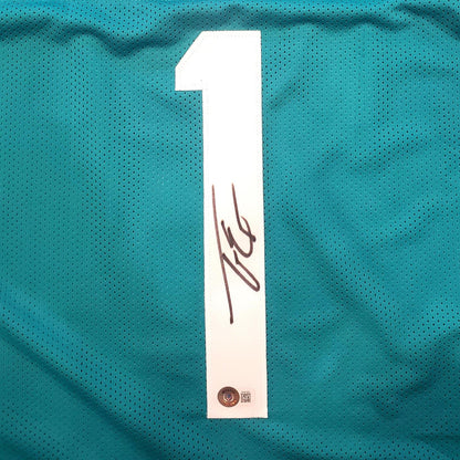 Travis Etienne Autographed Jacksonville (Teal #1) Custom Jersey - Beckett